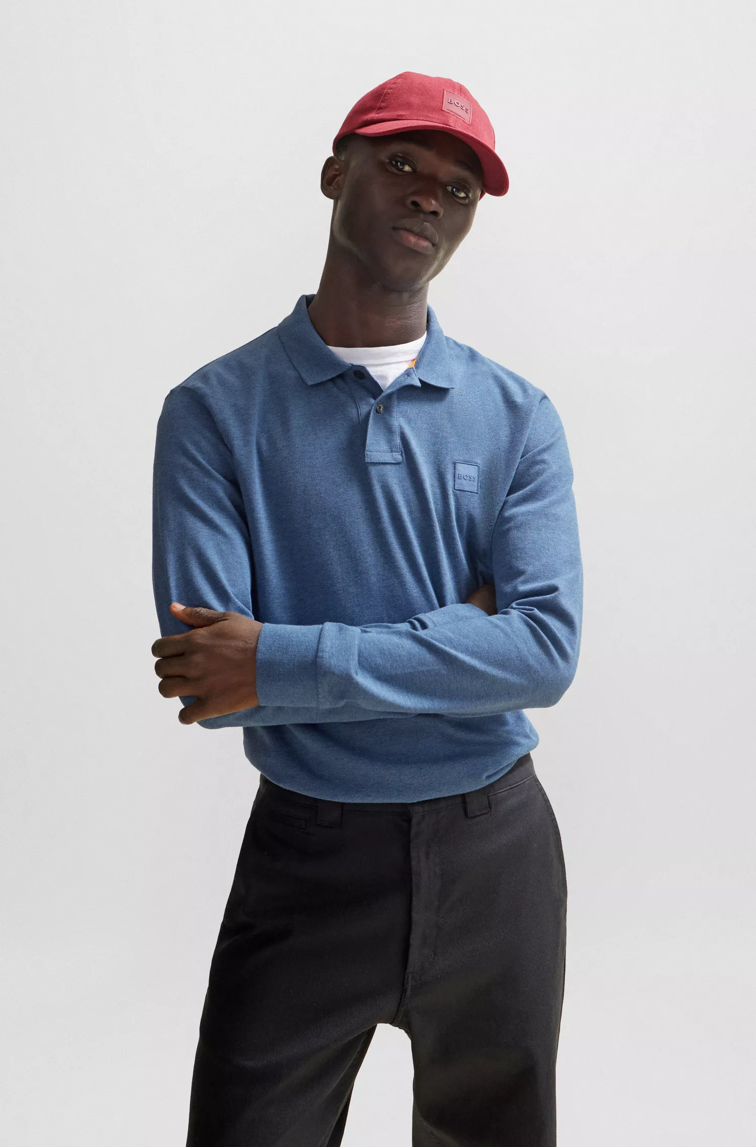 Camisa polo BOSS laranja em algodão stretch com etiqueta com o logotipo.