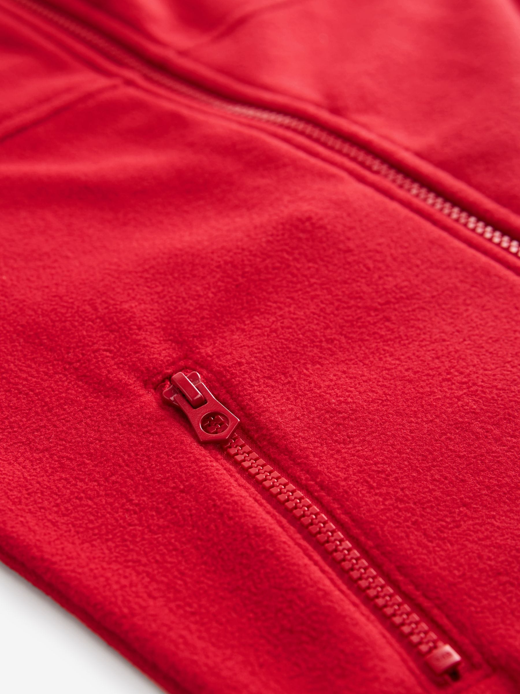 Rood - Fleece jack met rits en zakken (3-16 jr)