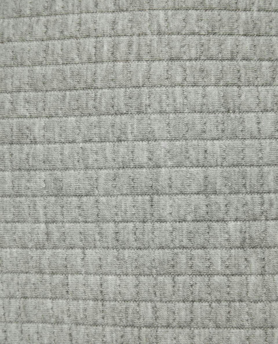 CAPA DE ALMOFADA EM JACQUARD XADREZ