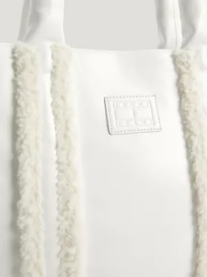 Bolsa média com acabamento em sherpa