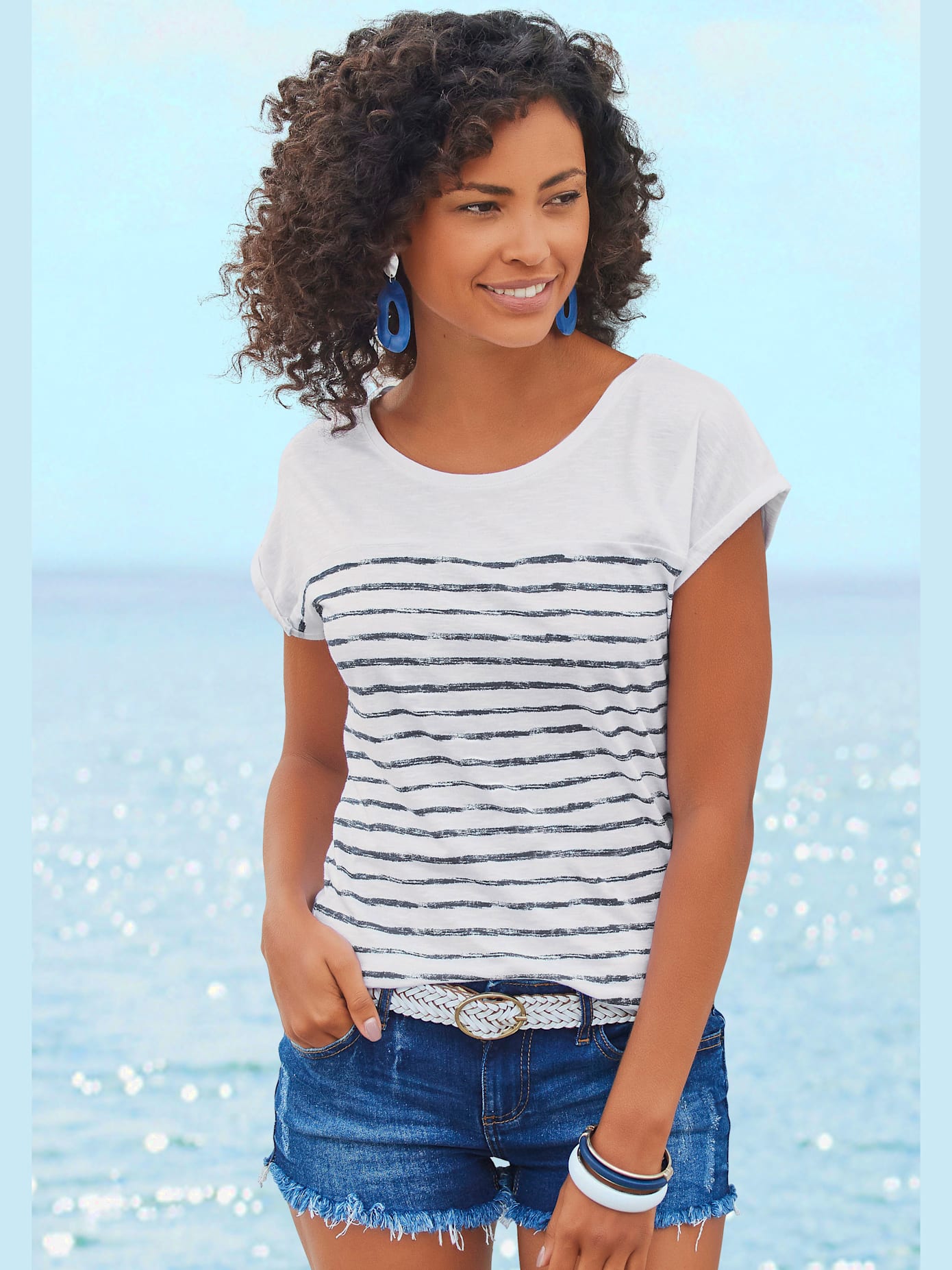 T-shirt manches à bords francs avec ourlet à revers