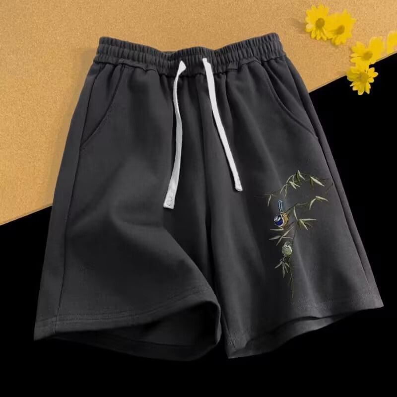 Cowpow - Zweetshorts met trekkoord en geborduurde vogels
