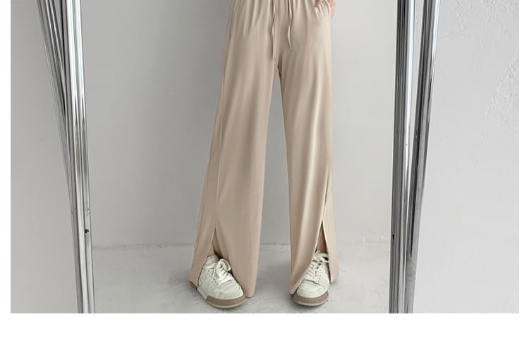 Shira - Koelere joggingbroek met wijde pijpen en split