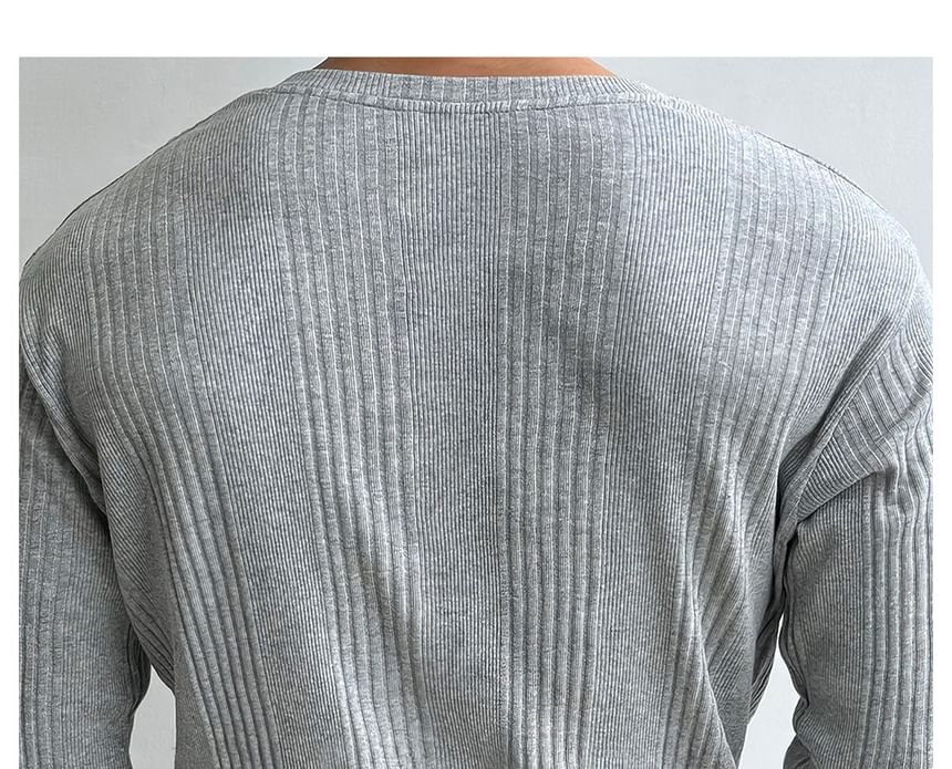 Okwano - Gebreide top met lange mouwen en Henley-hals en patroon