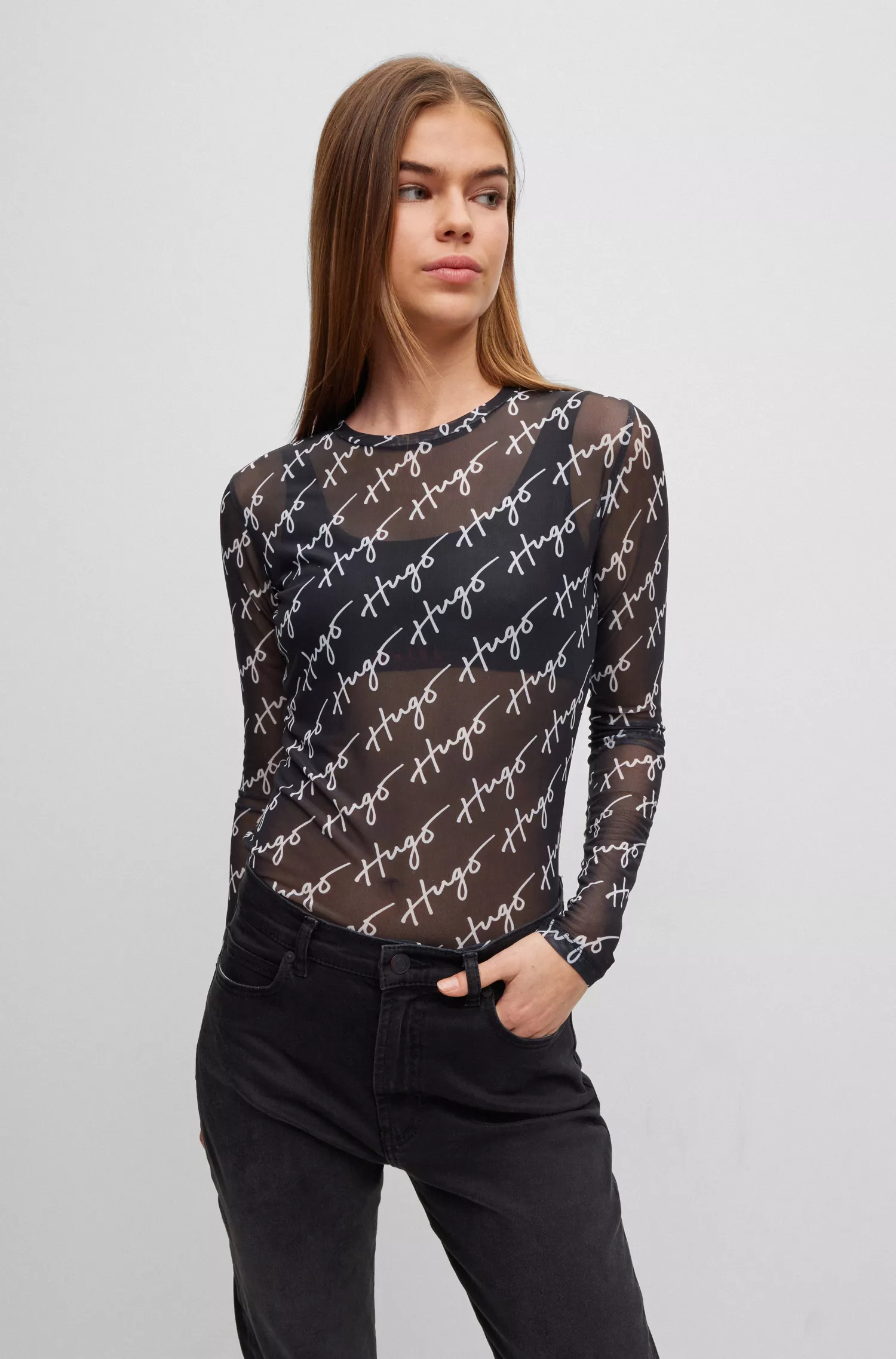 Blusa HUGO vermelha de manga comprida em malha elástica com logotipos manuscritos.