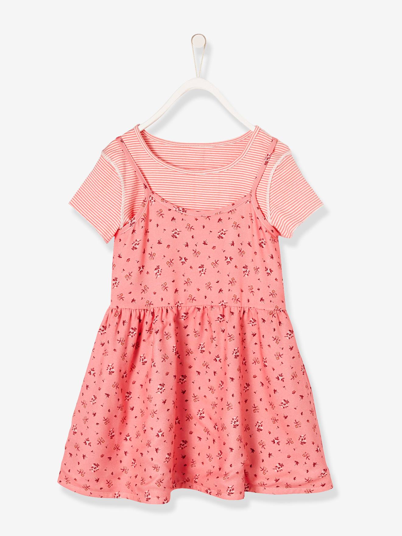 Vestido reversível para meninas em dois tecidos estampados rosa claro.