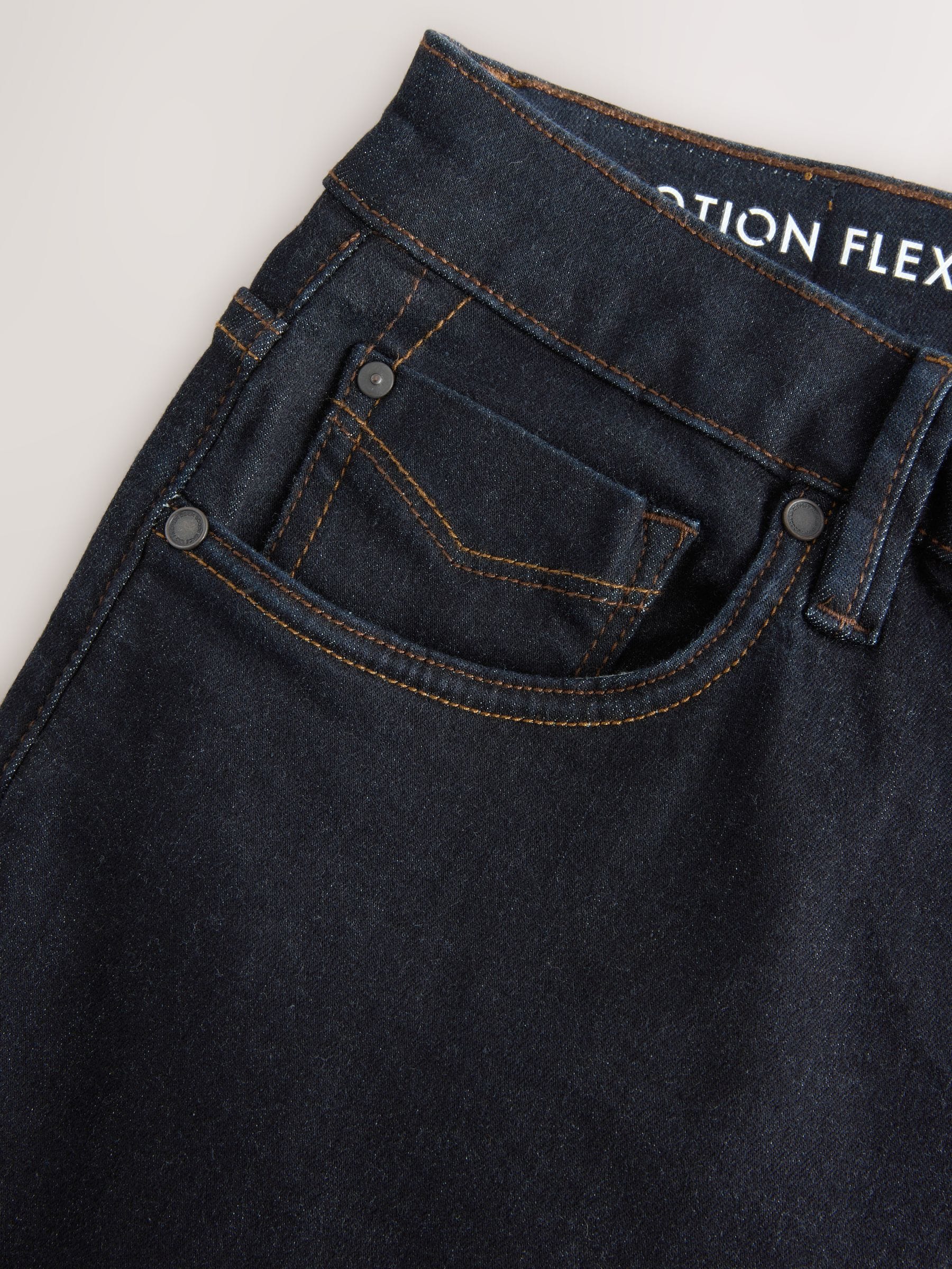 Blauw met wassing - Standaard toelopende pasvorm - Motionflex jeans