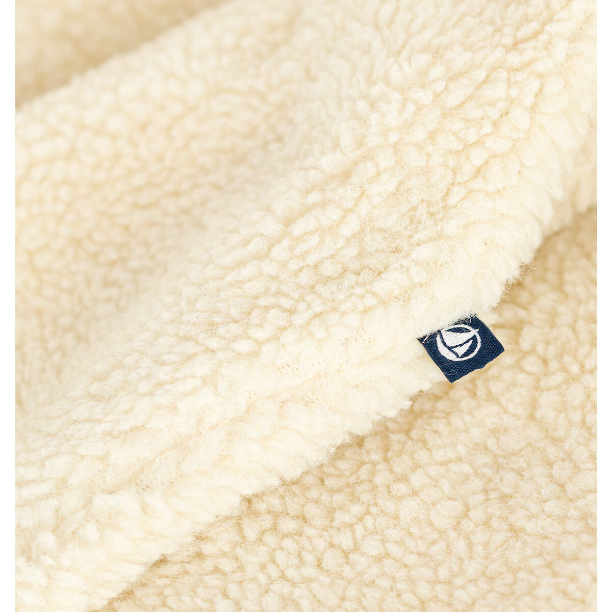 PETIT BATEAU<br>Traje piloto combinado, efeito ovelha