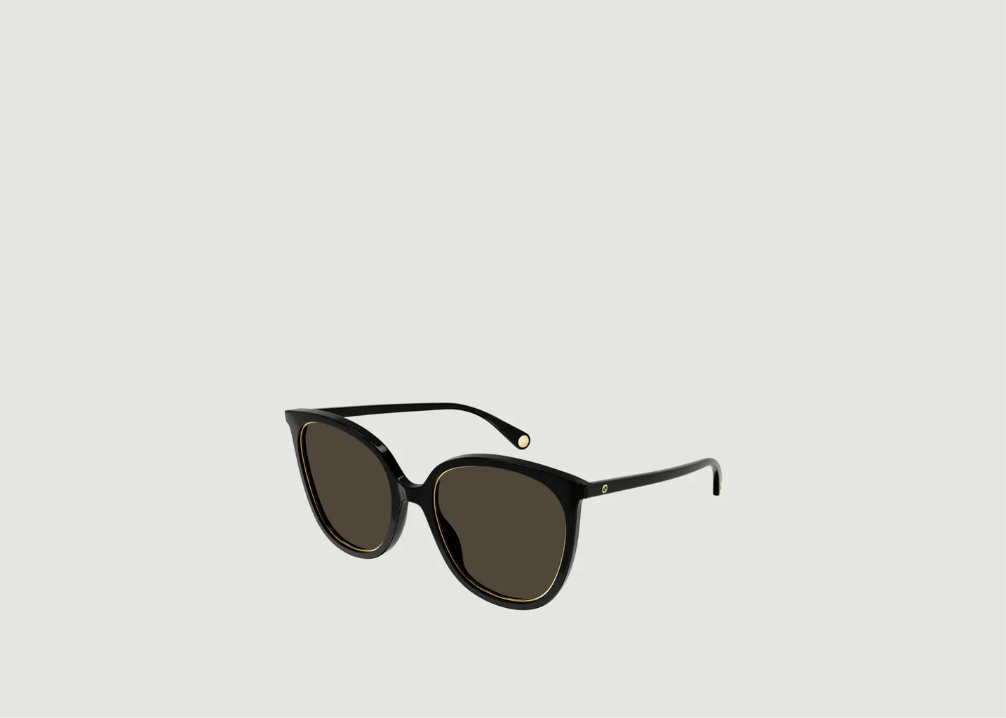 Lunettes de soleil avec cerclage doré Gucci
