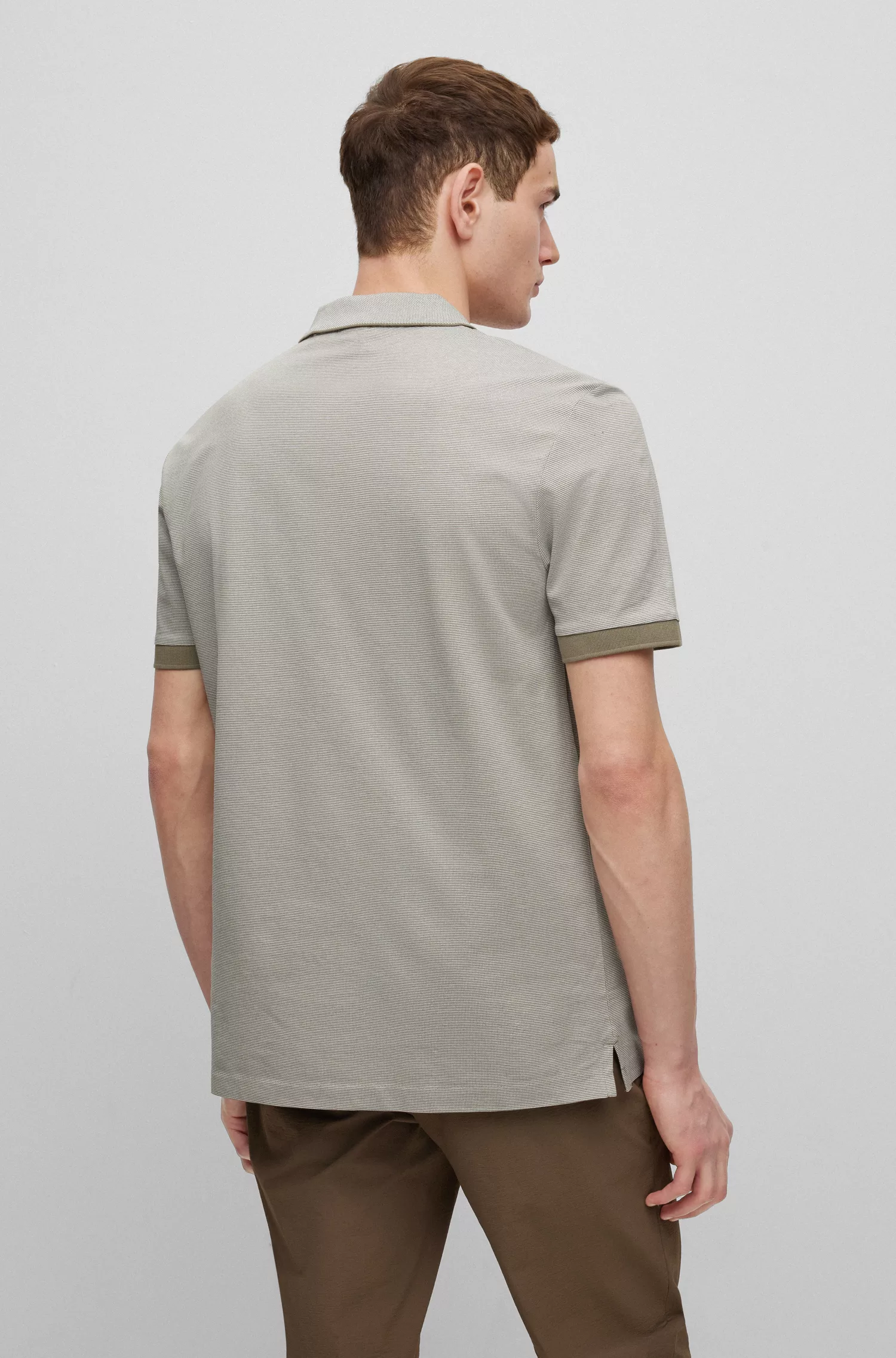 Camisa polo BOSS preta, corte regular, com microestampa bicolor.