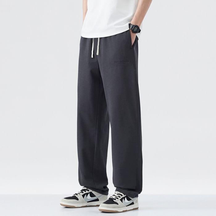 Nataro - Effen joggingbroek met trekkoord in de taille en wijde pijpen