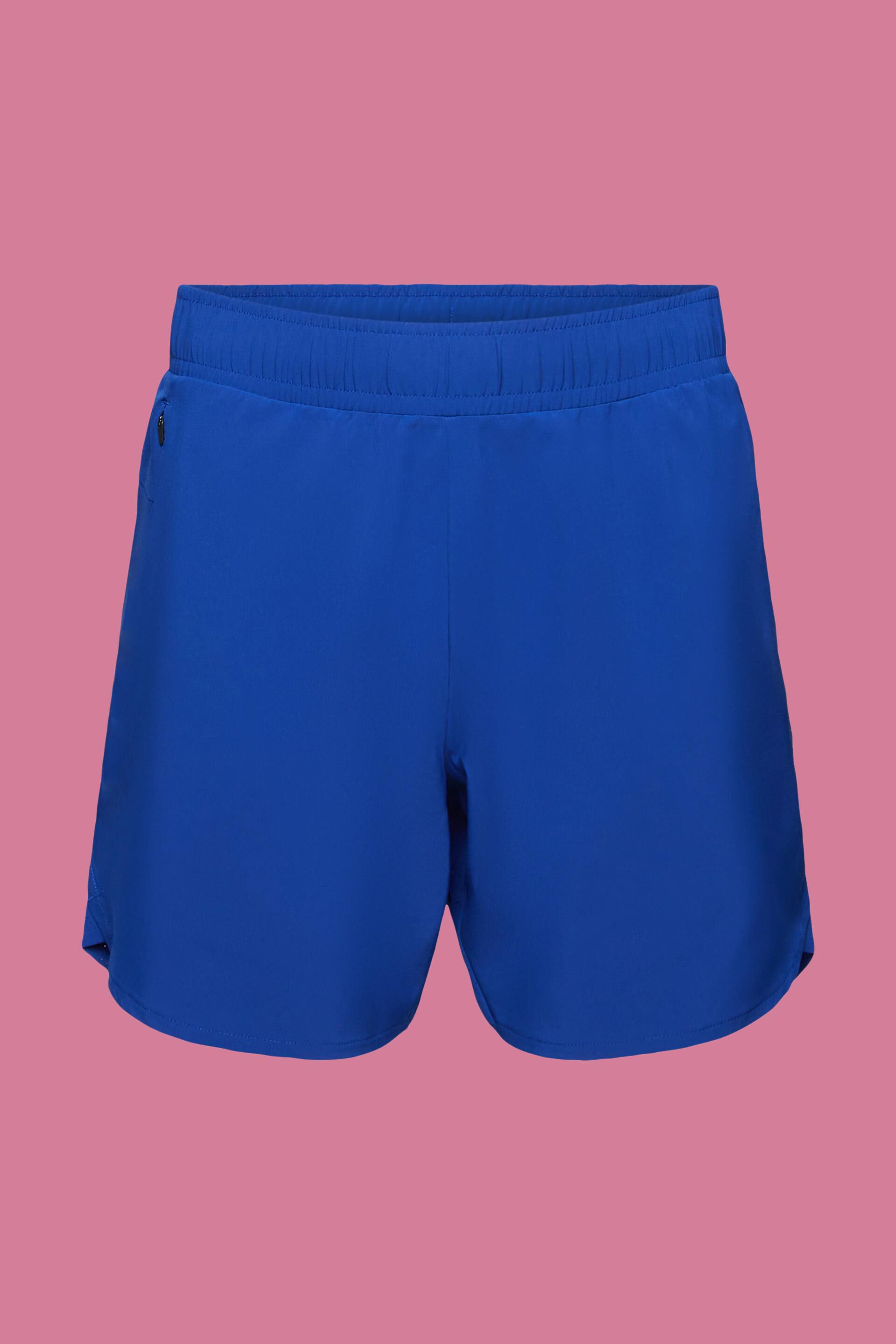 Short de sport à poches zippées