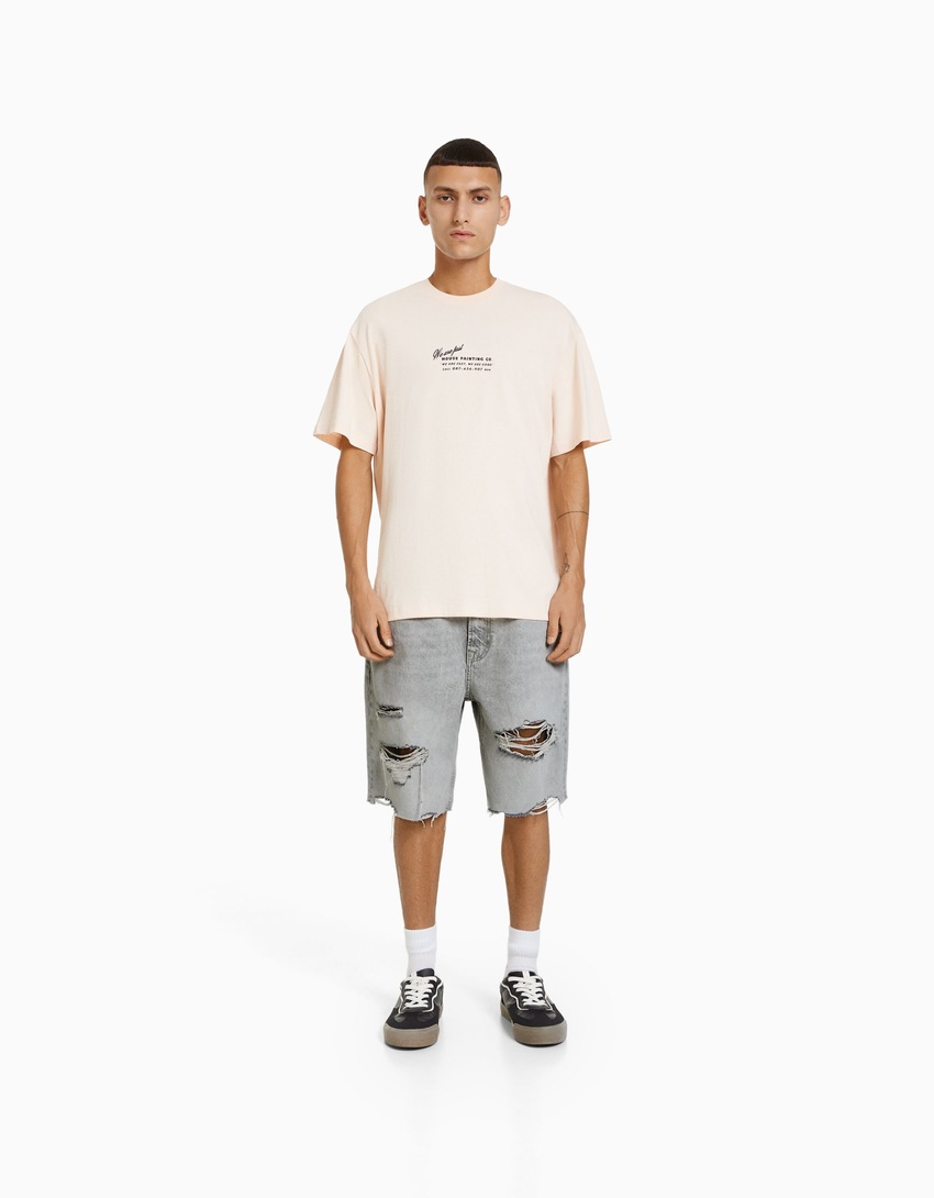 Bermuda jeans rasgada de corte justo