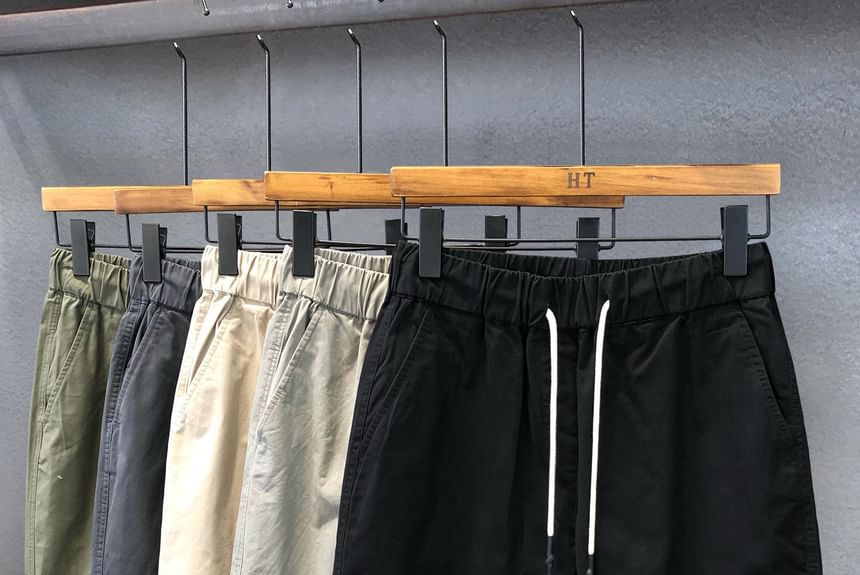 Adotuastic - Effen shorts met wijde pijpen en trekkoord in de taille