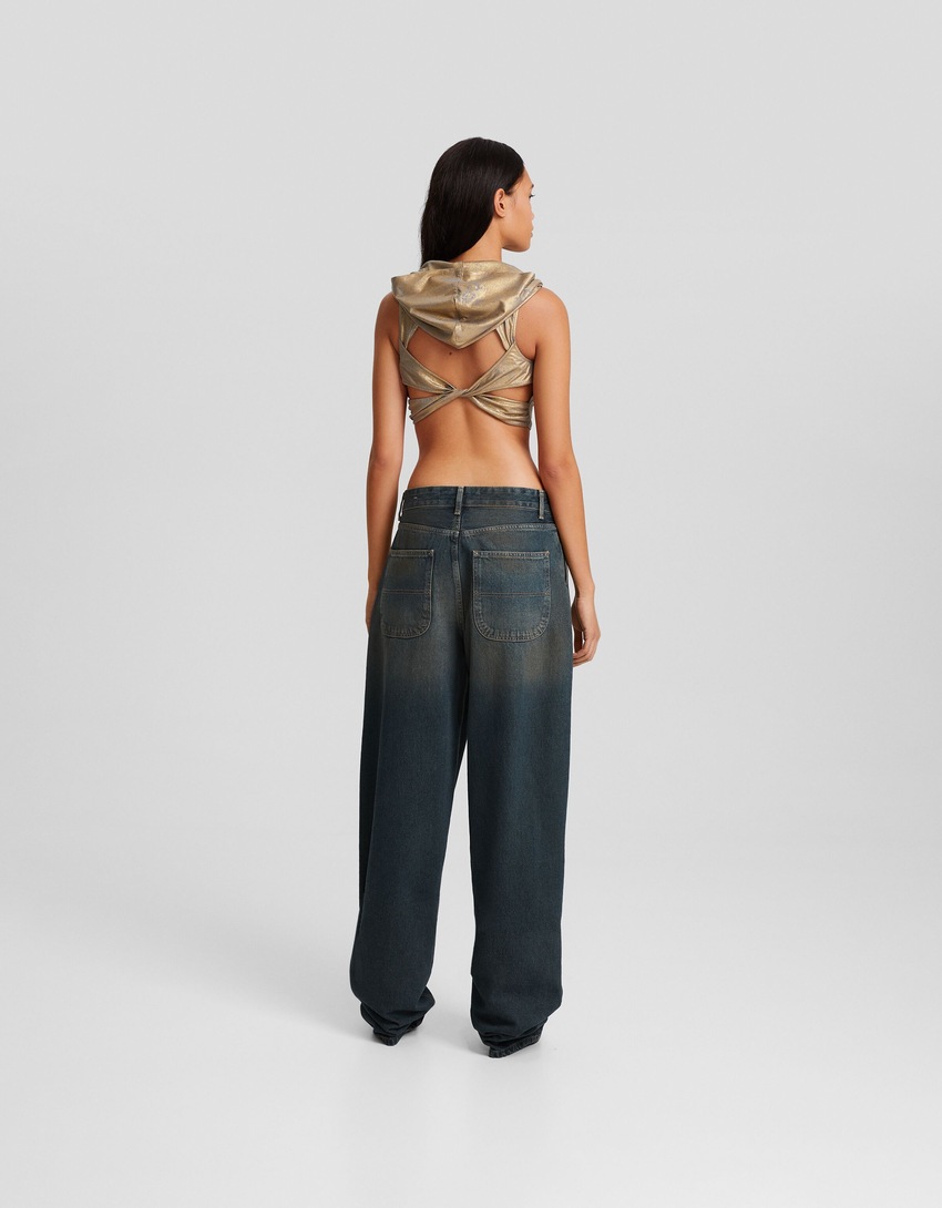 calça jeans estilo skater com efeito desbotado