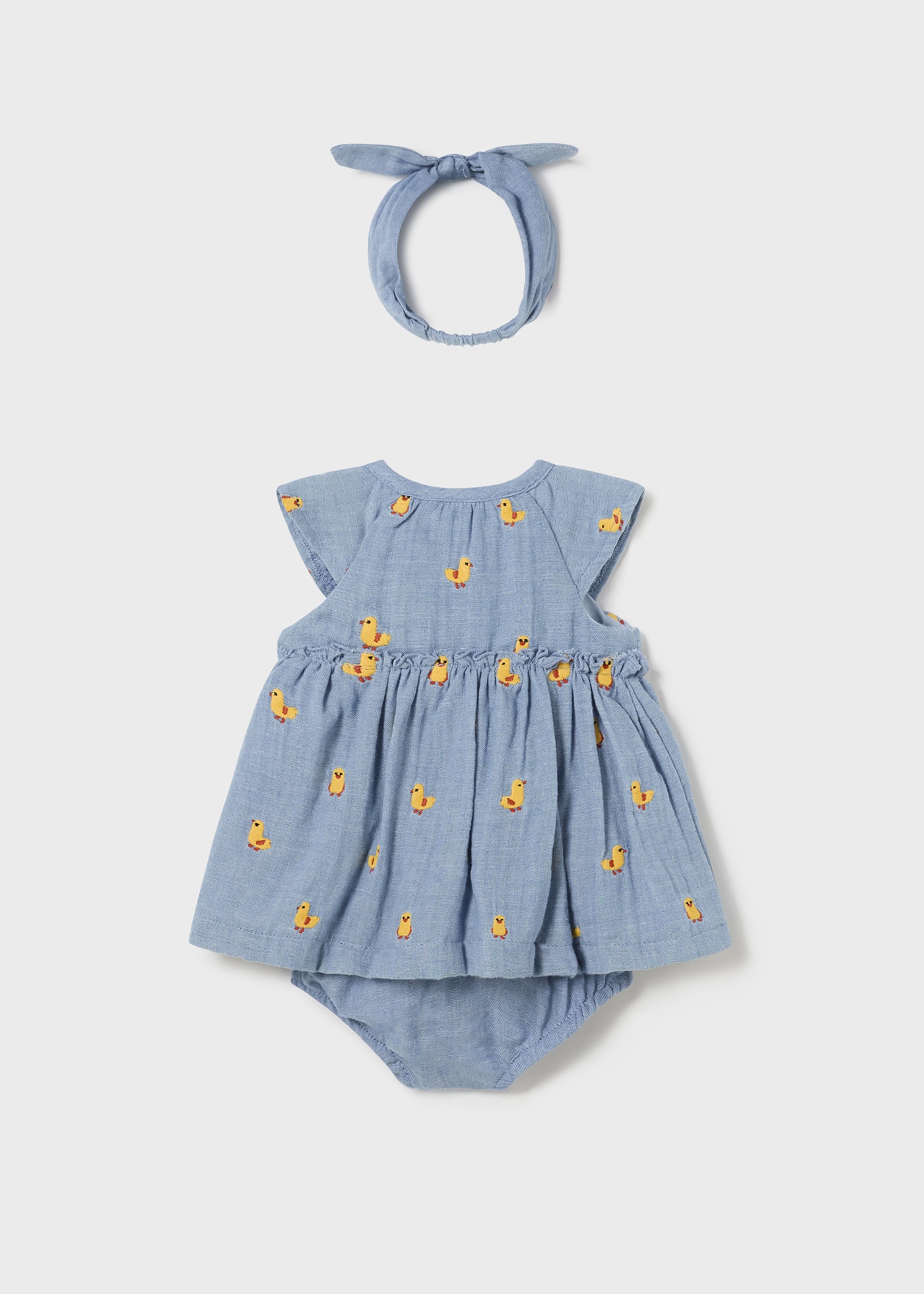 Vestido Jade para recém-nascido da Better Cotton com capa de fralda e faixa de cabelo.