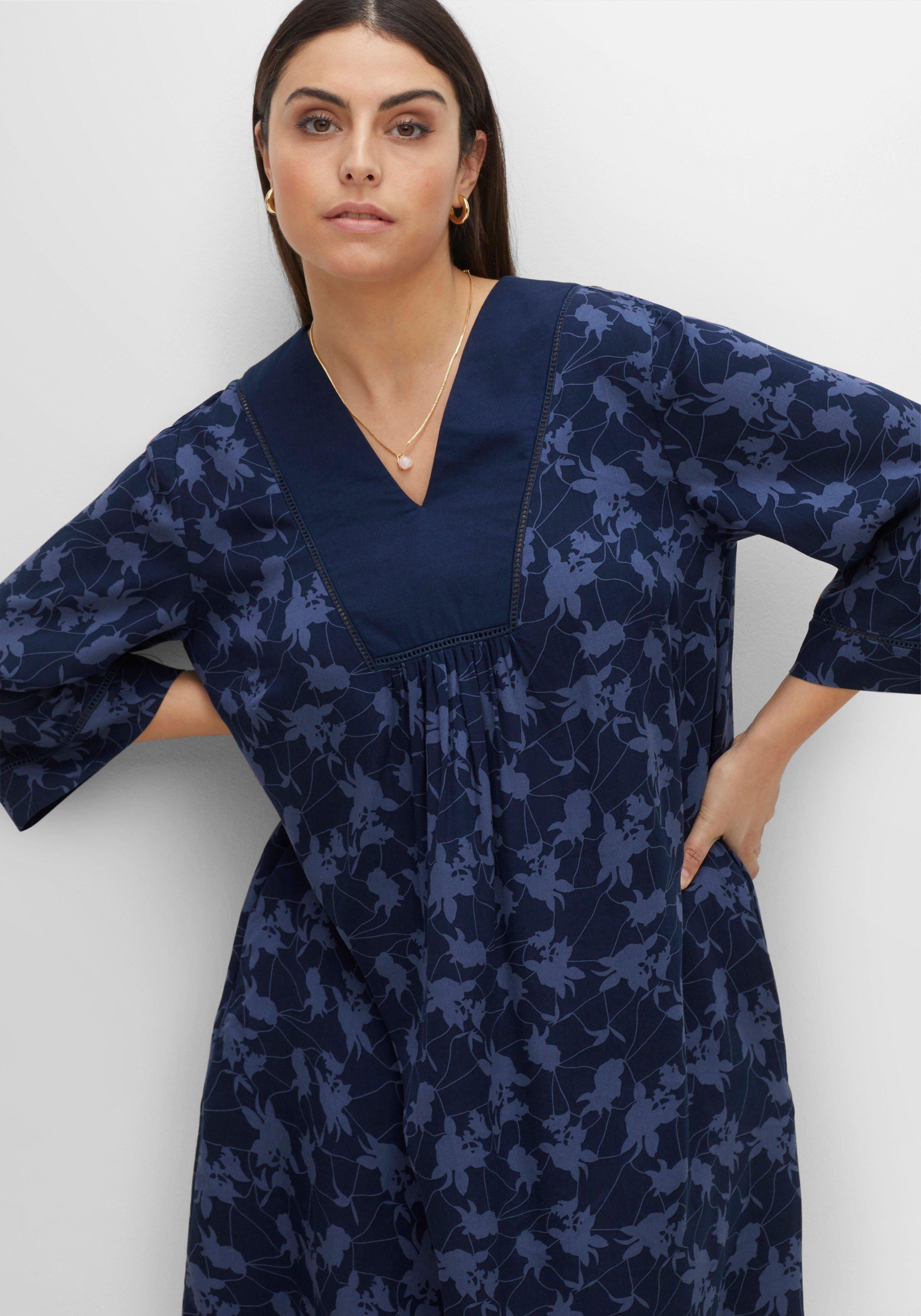 Kleid mit 3/4-Ärmeln und V-Ausschnitt