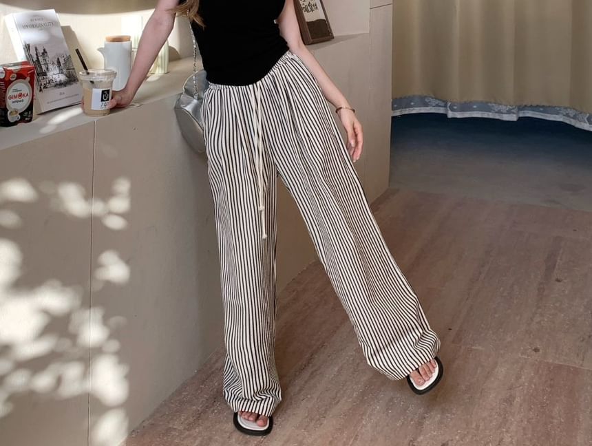 Moon City - Gestreepte broek met hoge taille en wijde pijpen