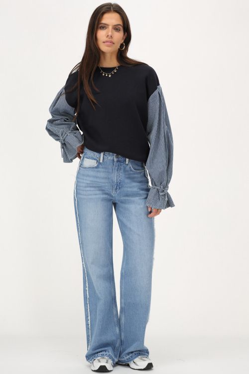 Lichtblauwe wide leg jeans met contrasterende zak