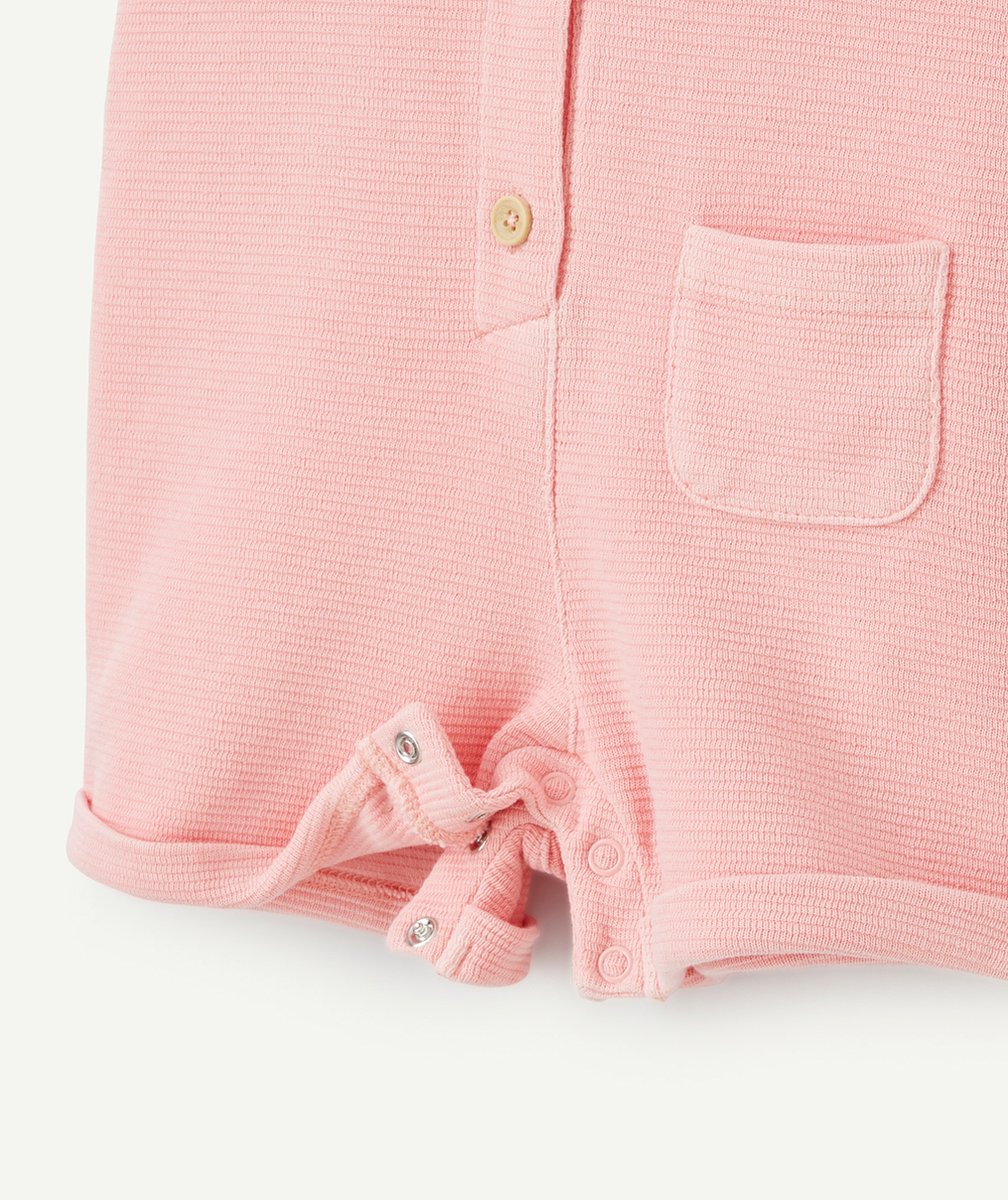 salopette bébé fille rose en nid d'abeilles avec noeuds