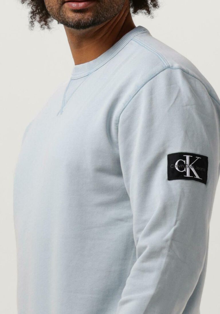 CALVIN KLEIN blauwe calvin klein sweater washed badge crew neck