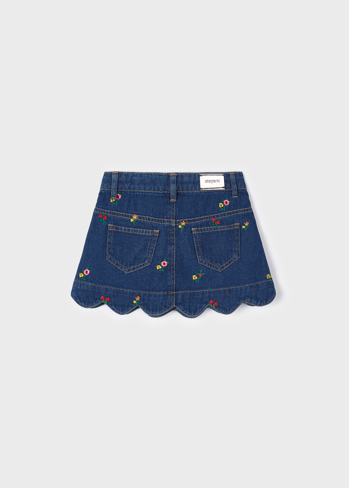 Saia jeans com bordado em algodão sustentável para meninas