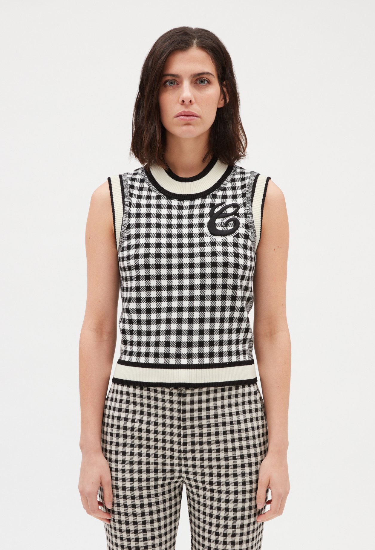 Pull sans manches carreaux bicolore