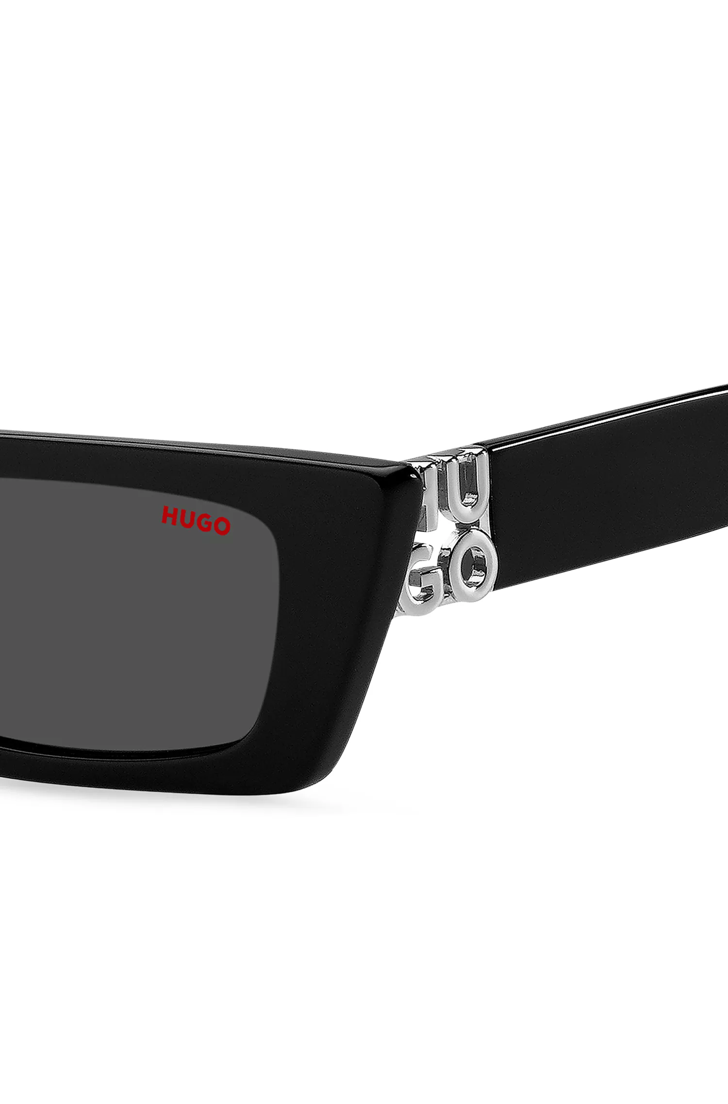 Óculos de sol HUGO em acetato vermelho e preto com monograma 3D.
