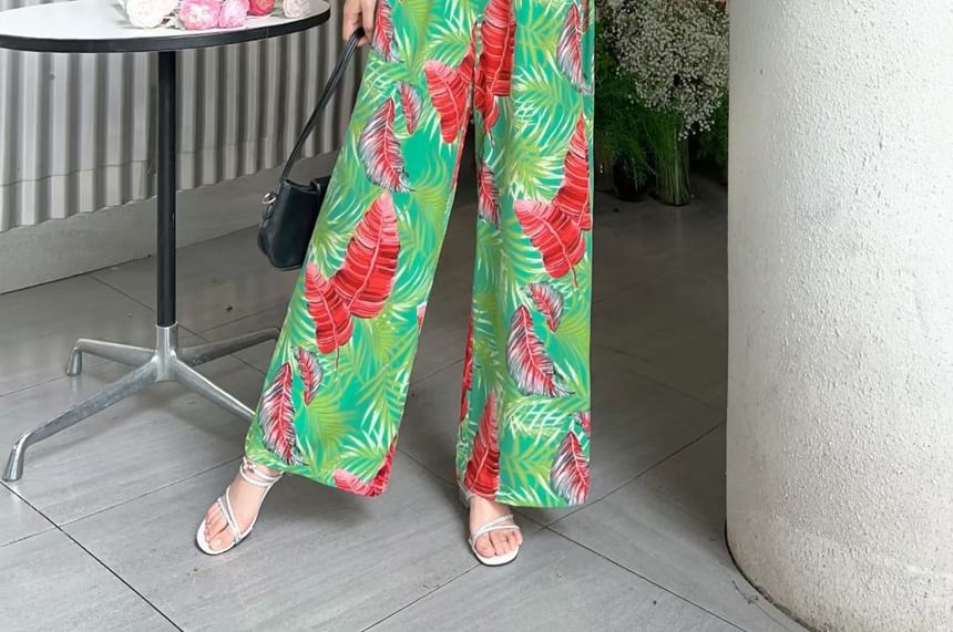 Yolandus - Jumpsuit met pofmouwen, vierkante hals en bladprint en wijde pijpen