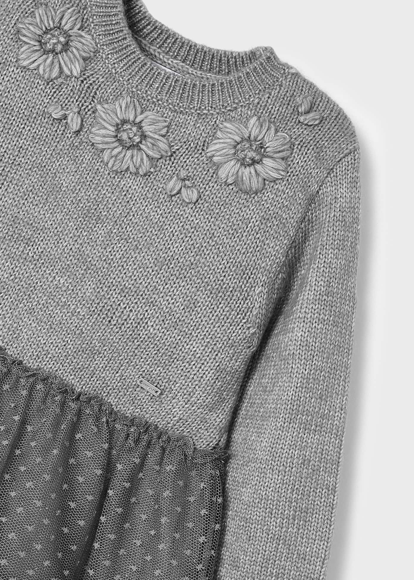 Vestido infantil combinando malha e tule.
