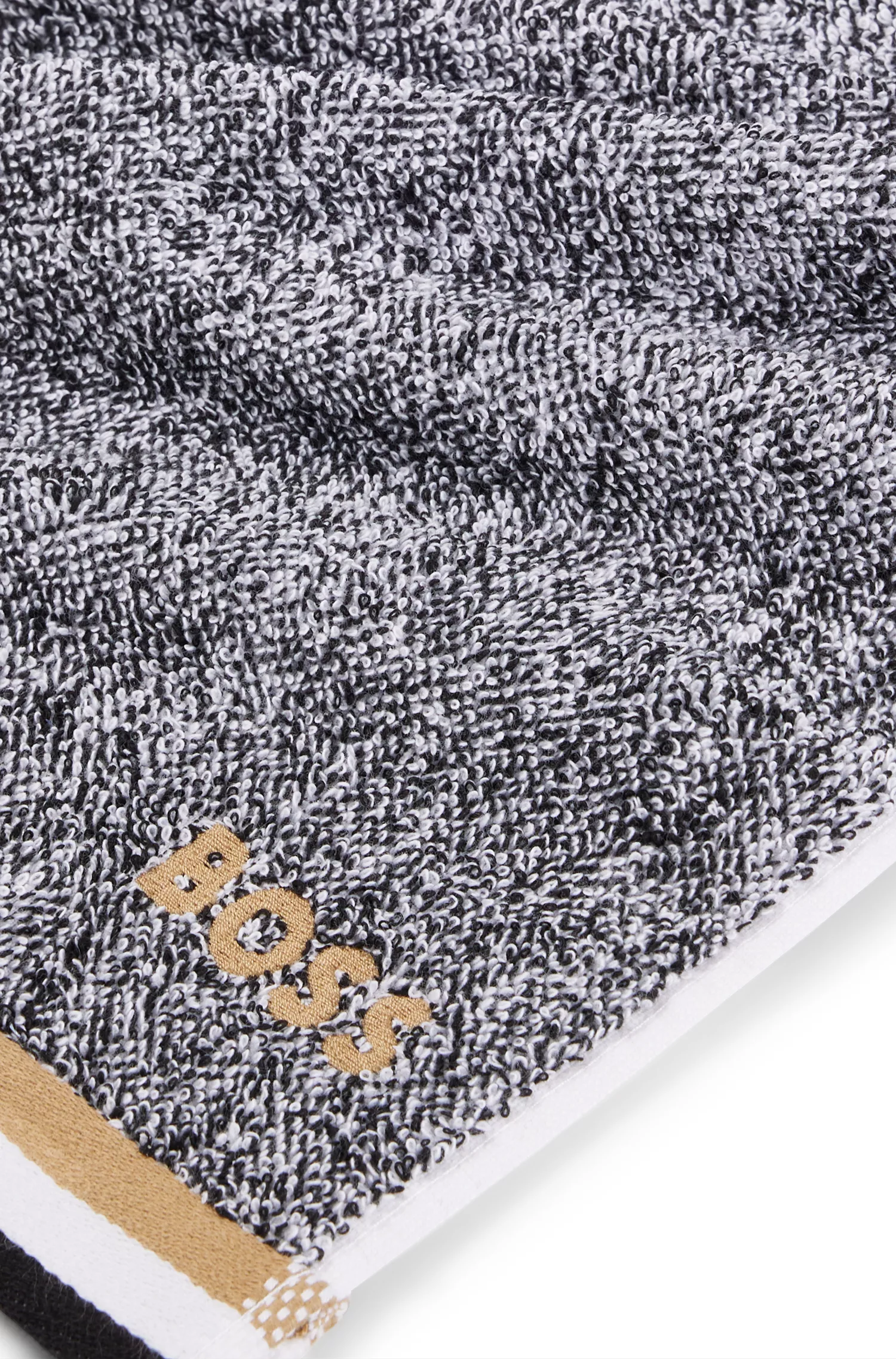 Toalha de mão BOSS em jacquard de algodão preto com debrum e logotipo.