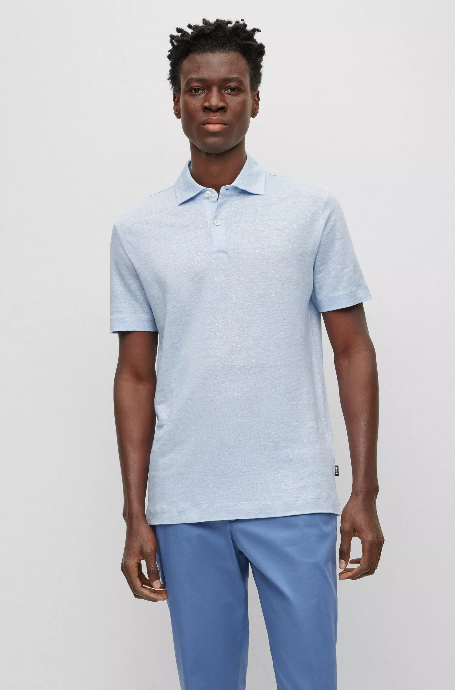 Camisa polo BOSS preta, corte regular, em linho bicolor.