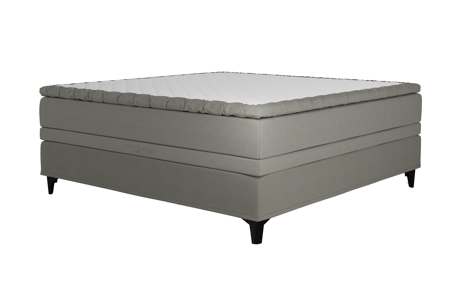 Majestic Crown kontinentalseng 210x210 cm i tekstil 213/223 oliven grønn med Majestic overmadrass og Exact funksjon. Medium/medium fasthet, seamless utførelse og Eicon ben sort med støtteben. Uten hodegavl