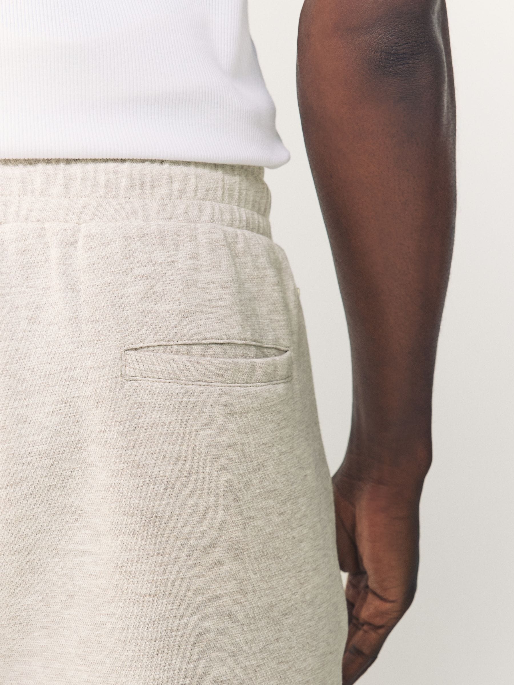 Gemêleerd naturel - Jersey shorts met ritszakje