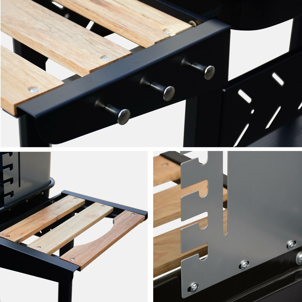 Barbecue au charbon. Noir et gris. Hauteur de grille ajustable. Cuve émaillée. Tablettes en bois + cheminée d’allumage