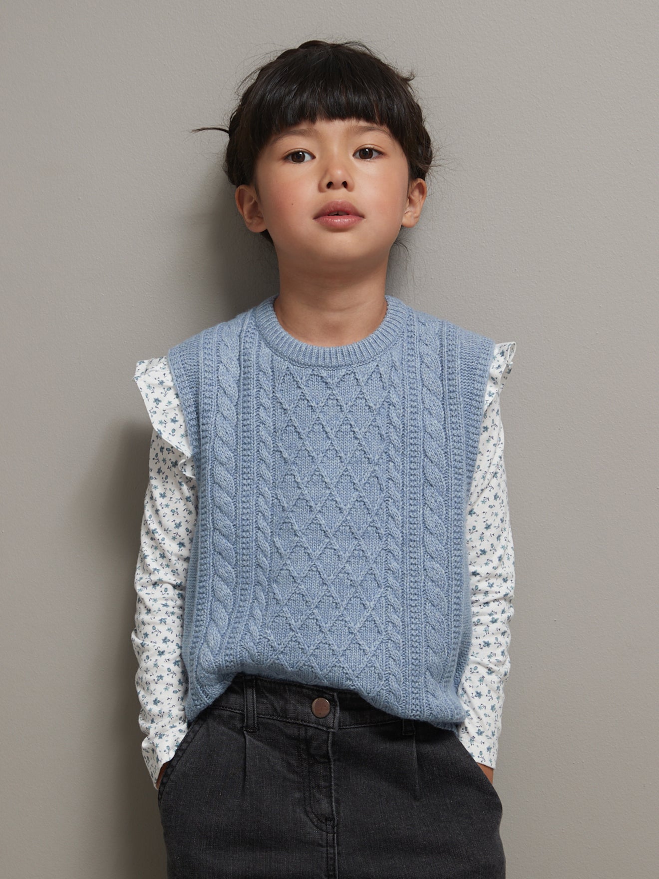 Pull torsadé fille sans manches