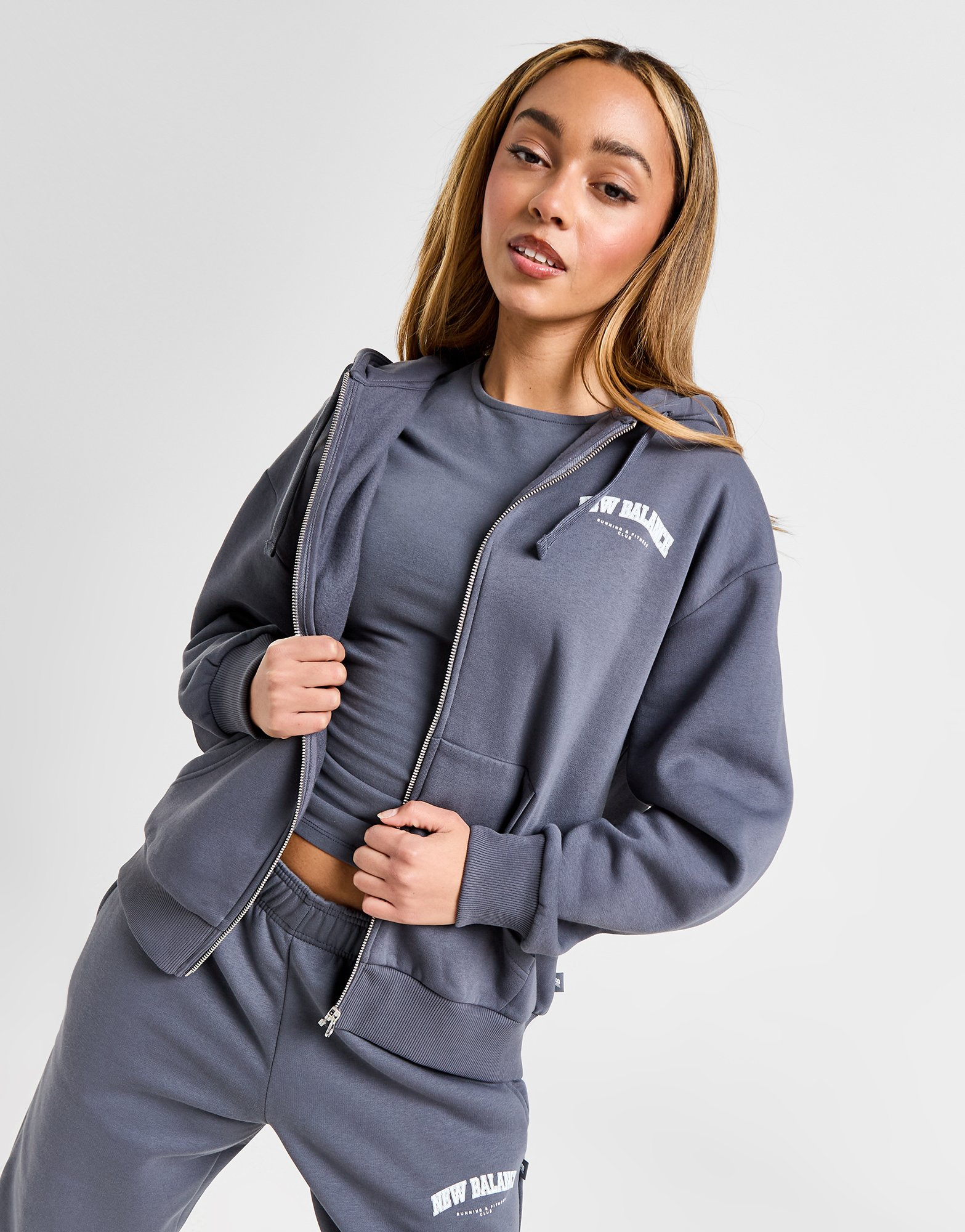 New Balance Sweat à Capuche Zippé Logo Femme