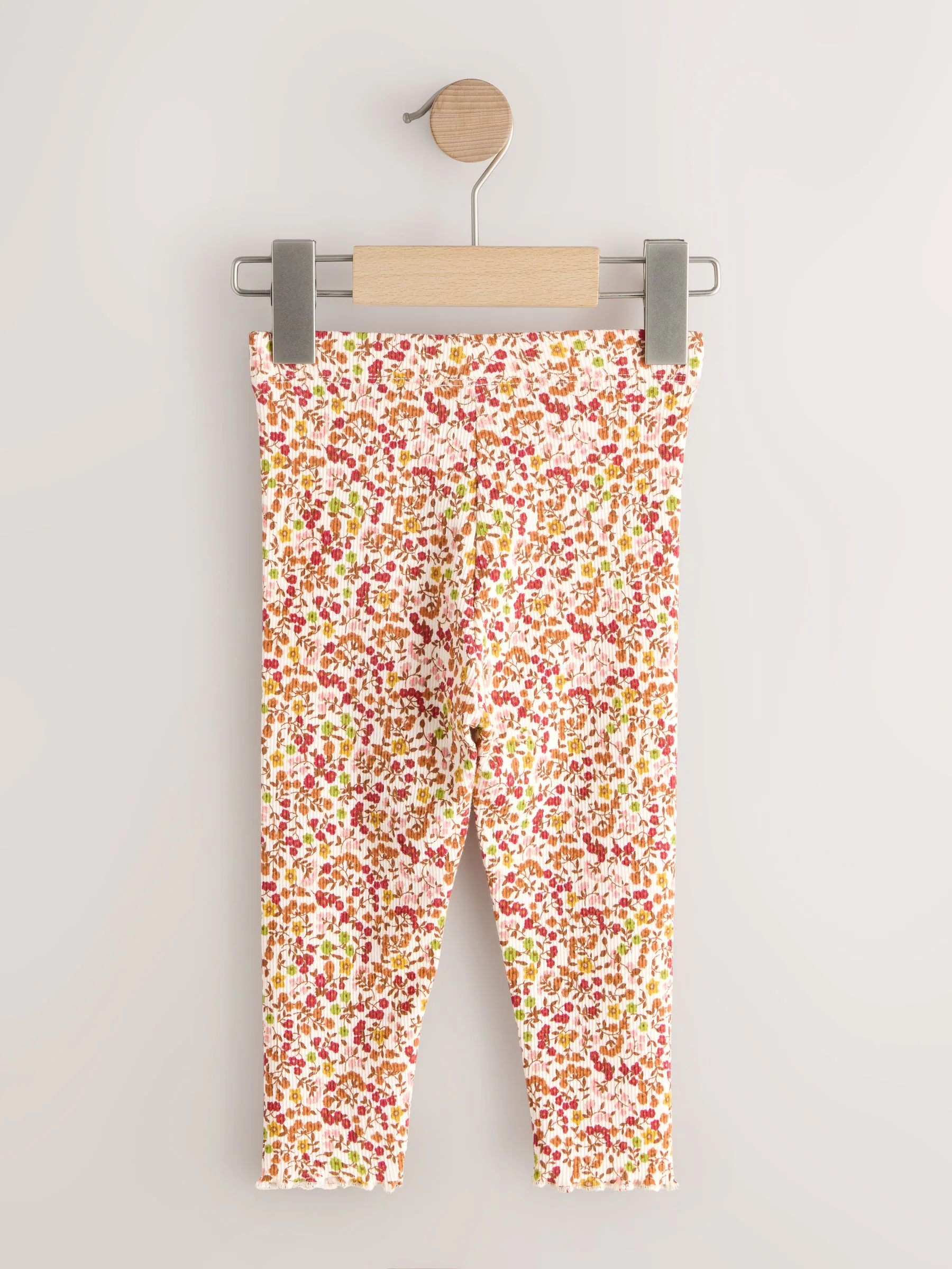 Oranje fijn gebloemd - Geribbelde legging (3mnd -7jr)