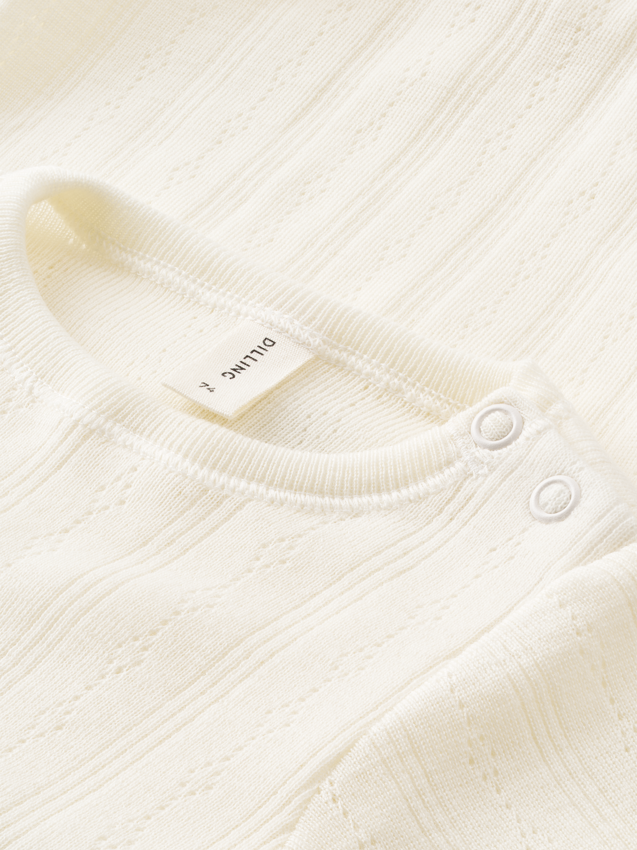 Pointelle romper met lange mouw van merinowol voor baby’s