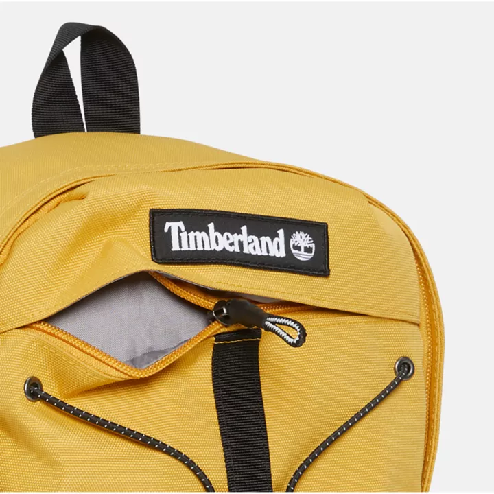 Mochila unissex Outdoor Archive Mini Bungee na cor amarela.