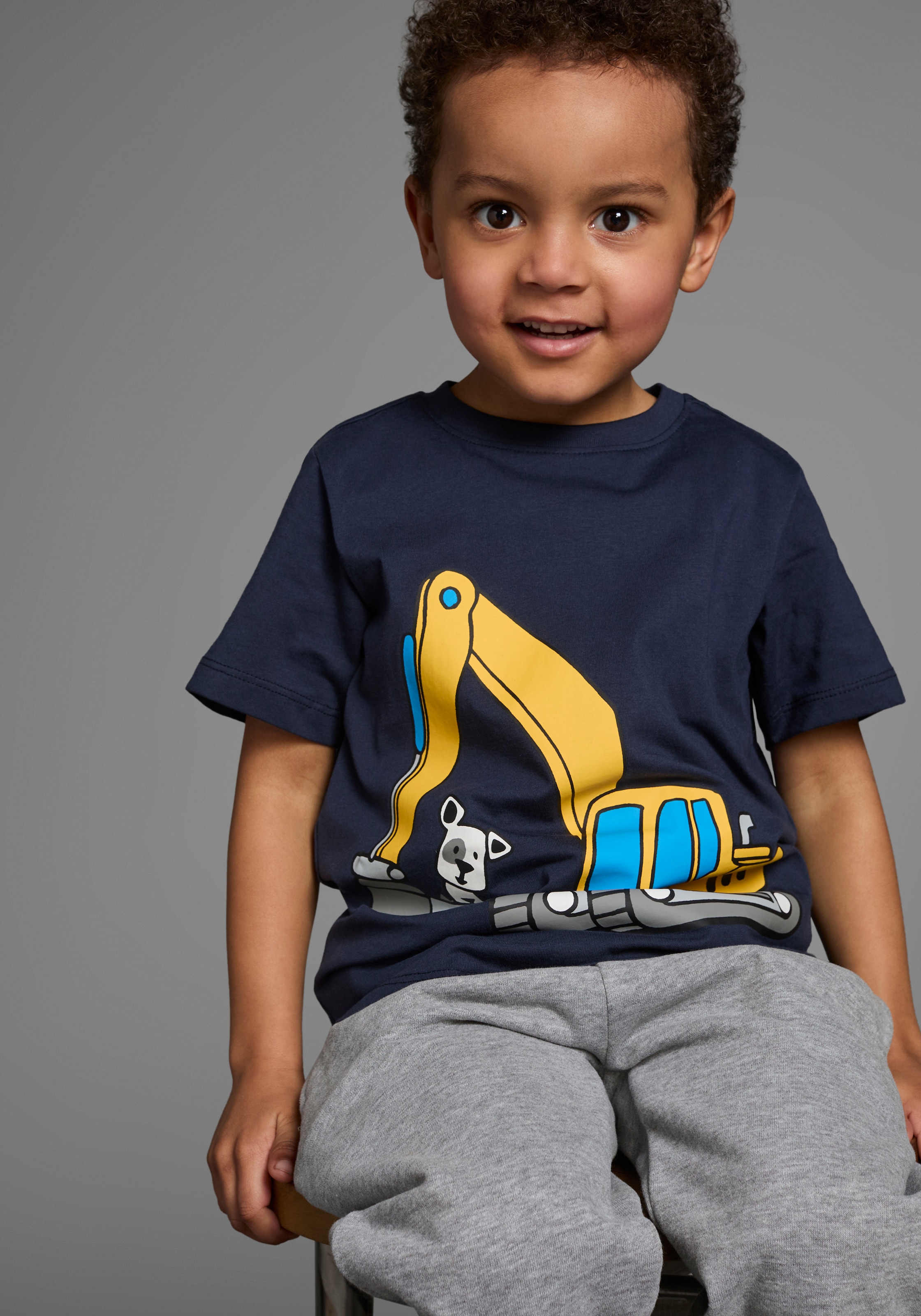 KIDSWORLD T-Shirt Kurzarm,  Basic-Passform,  mit stylischem Druck,  mit Rippbündchen