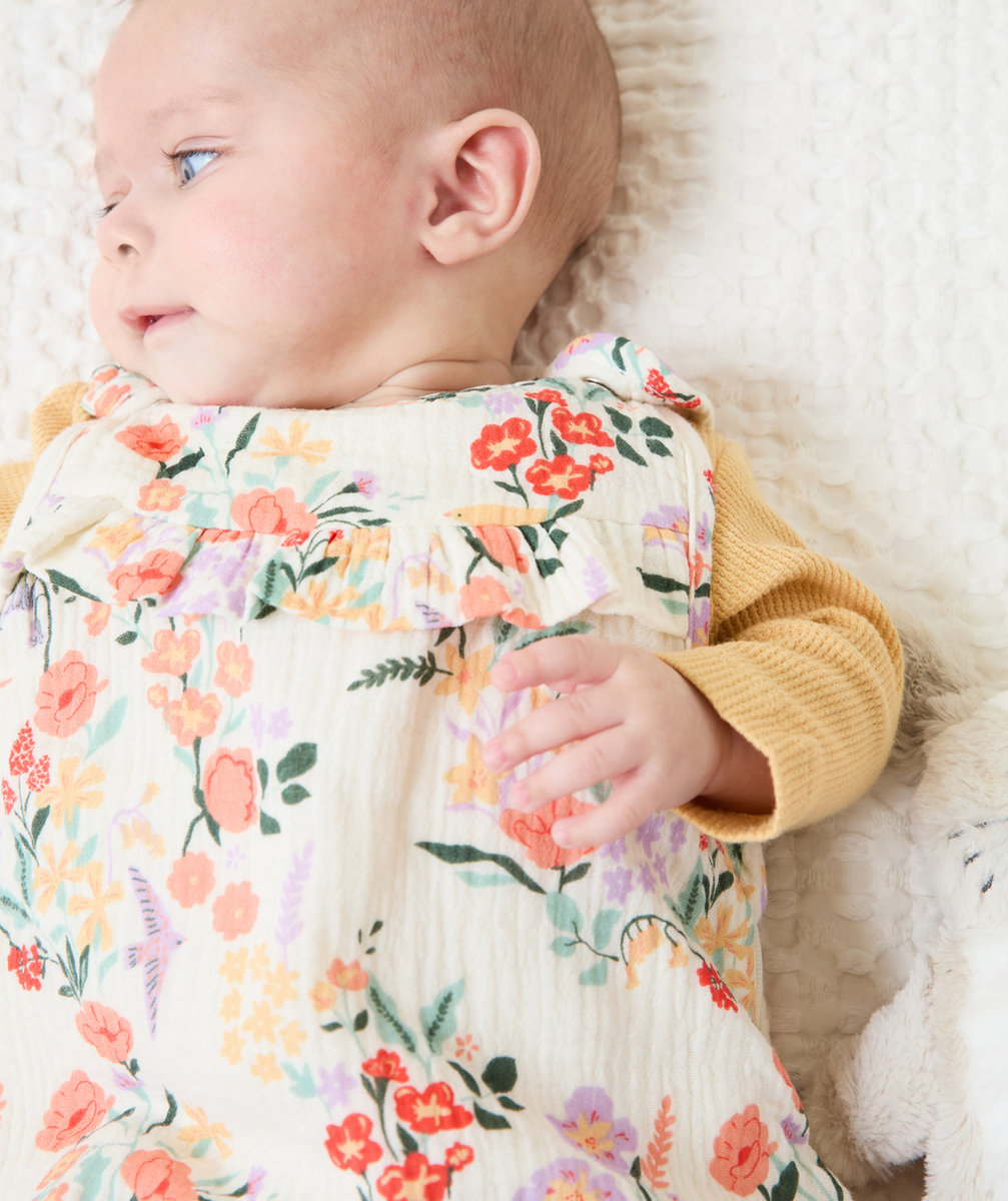 GIGOTEUSE BÉBÉ EN COTON BIO ÉCRU IMPRIMÉ FLEURI ET VOLANTS