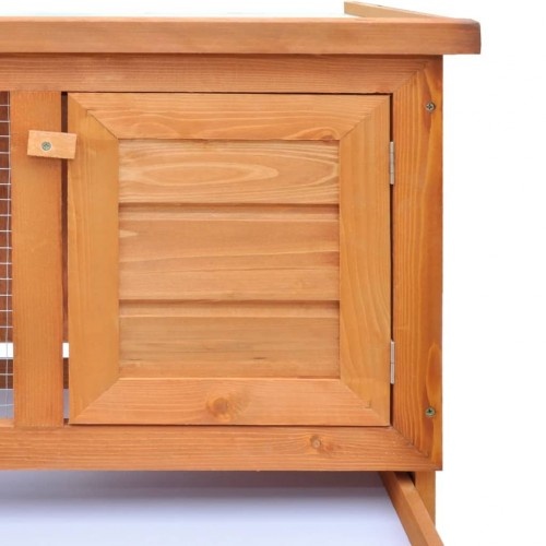 Gaiola de madeira para coelhos de pequeno porte.