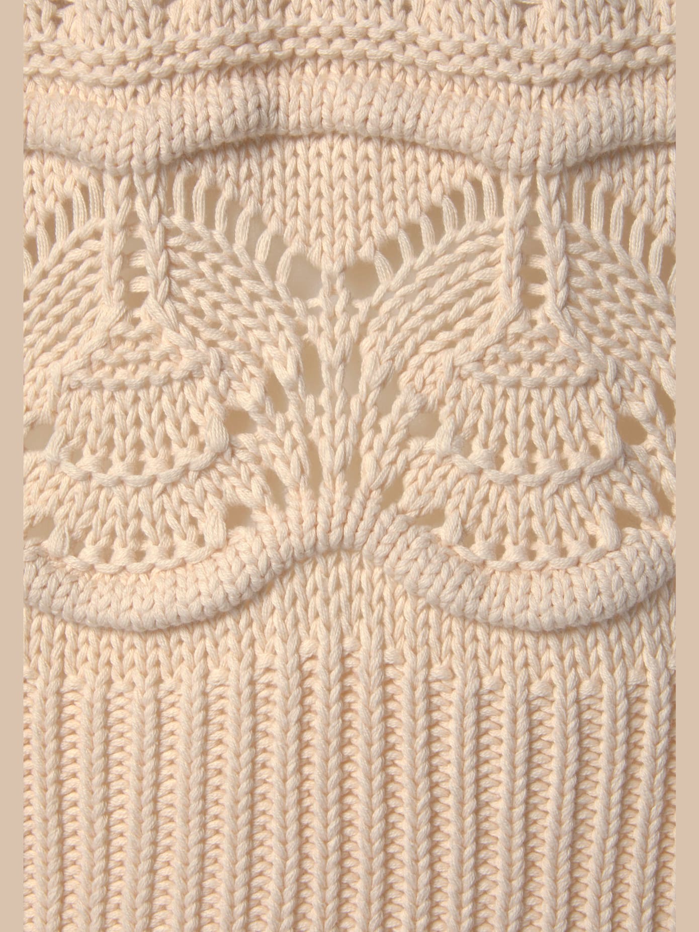 Pull col roulé en tricot ajouré