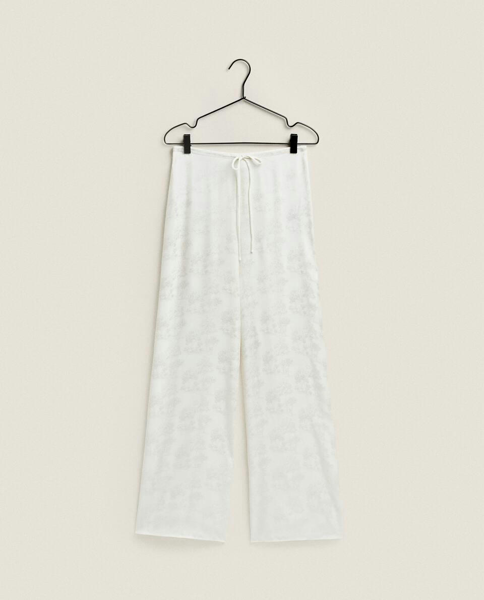 CALÇAS JACQUARD