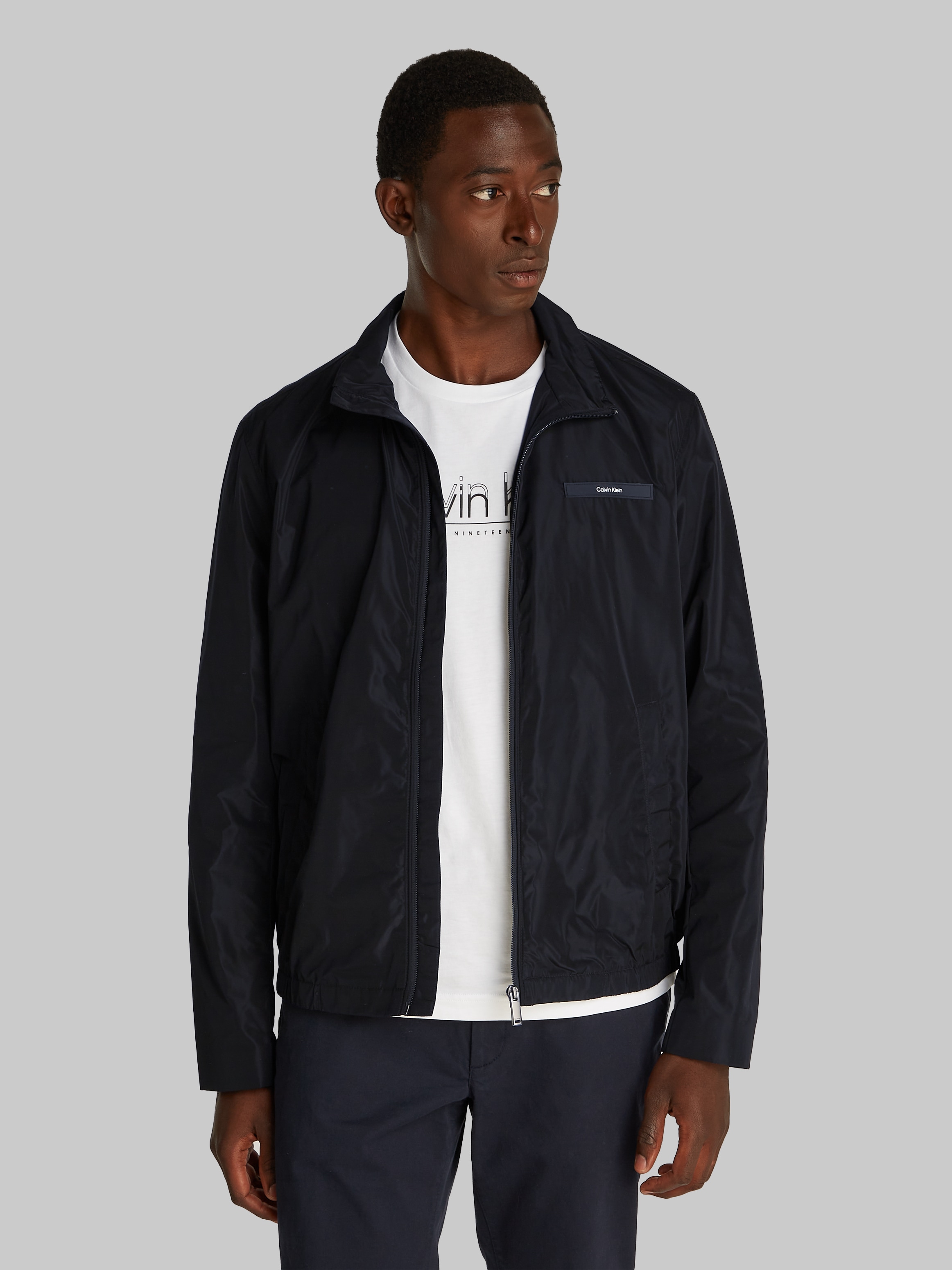 Calvin Klein Blouson »ESSENTIAL NYLON BLOUSON« mit Logo-Patch