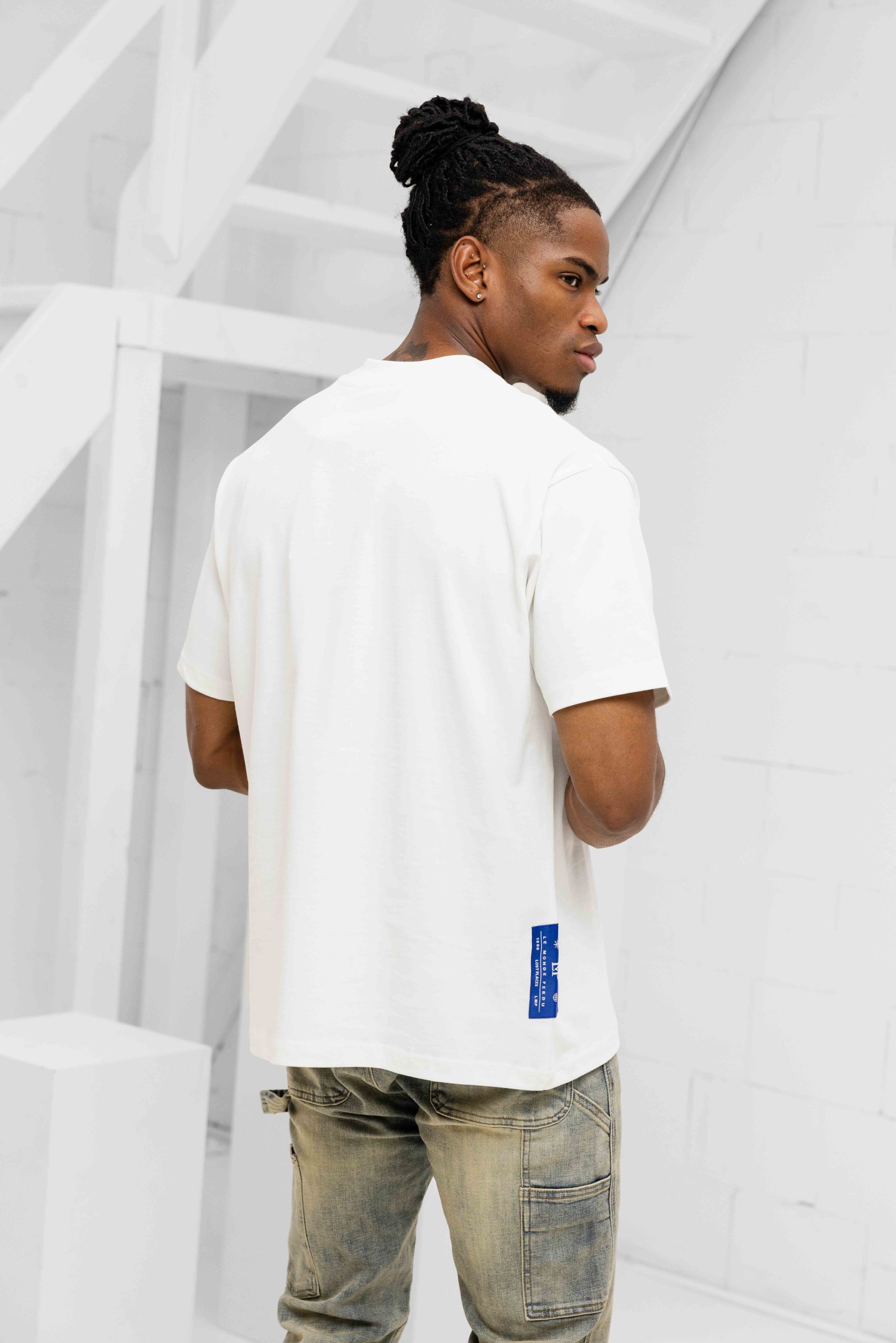 Le Monde Perdu Leaking Logo T-Shirt Heren Gebroken Wit