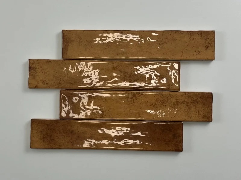 Tegelsample: Jabo Kalon wandtegel terracotta 5x25cm glans