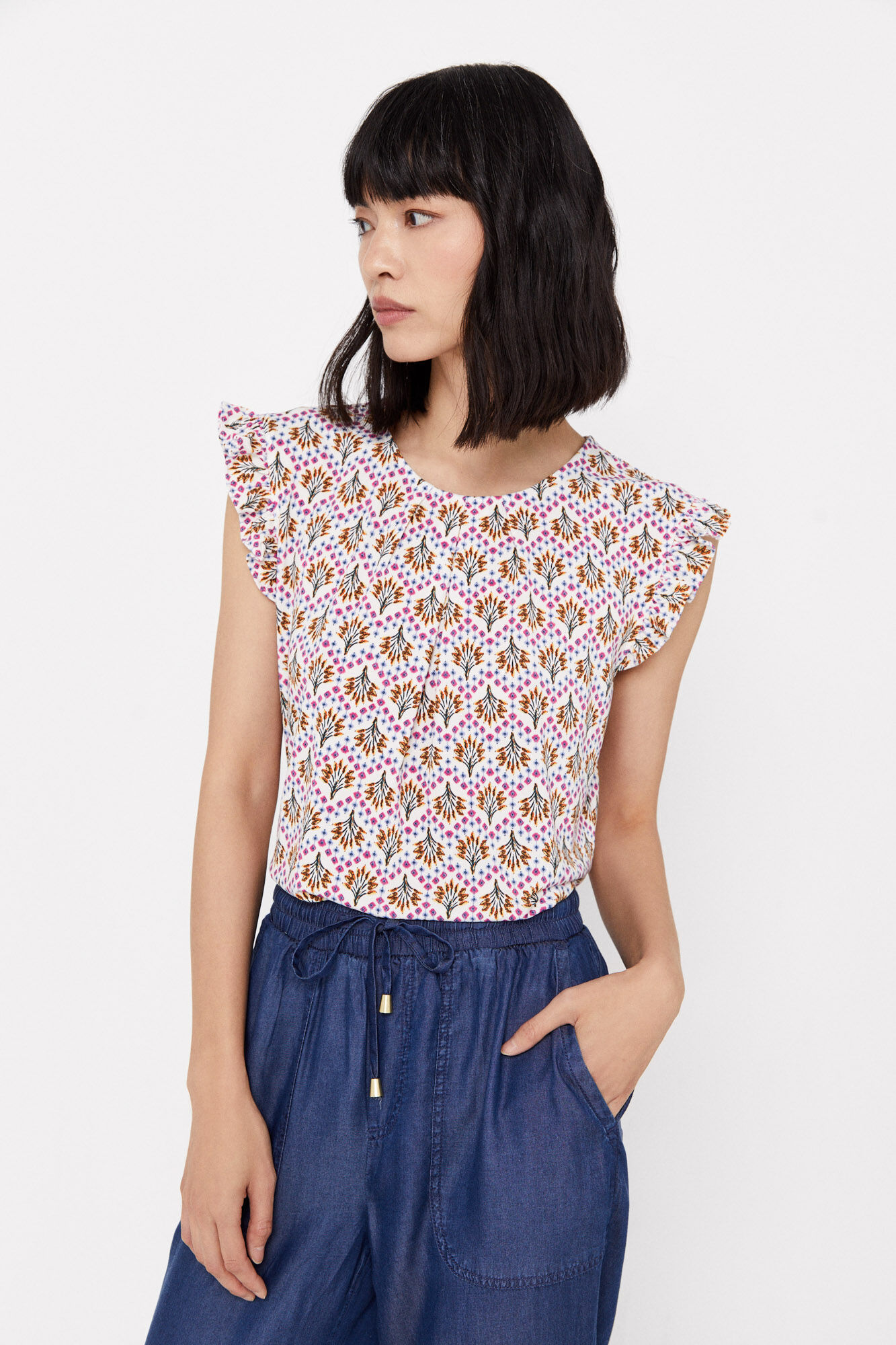 Blusa de malha plissada - Estampa branca