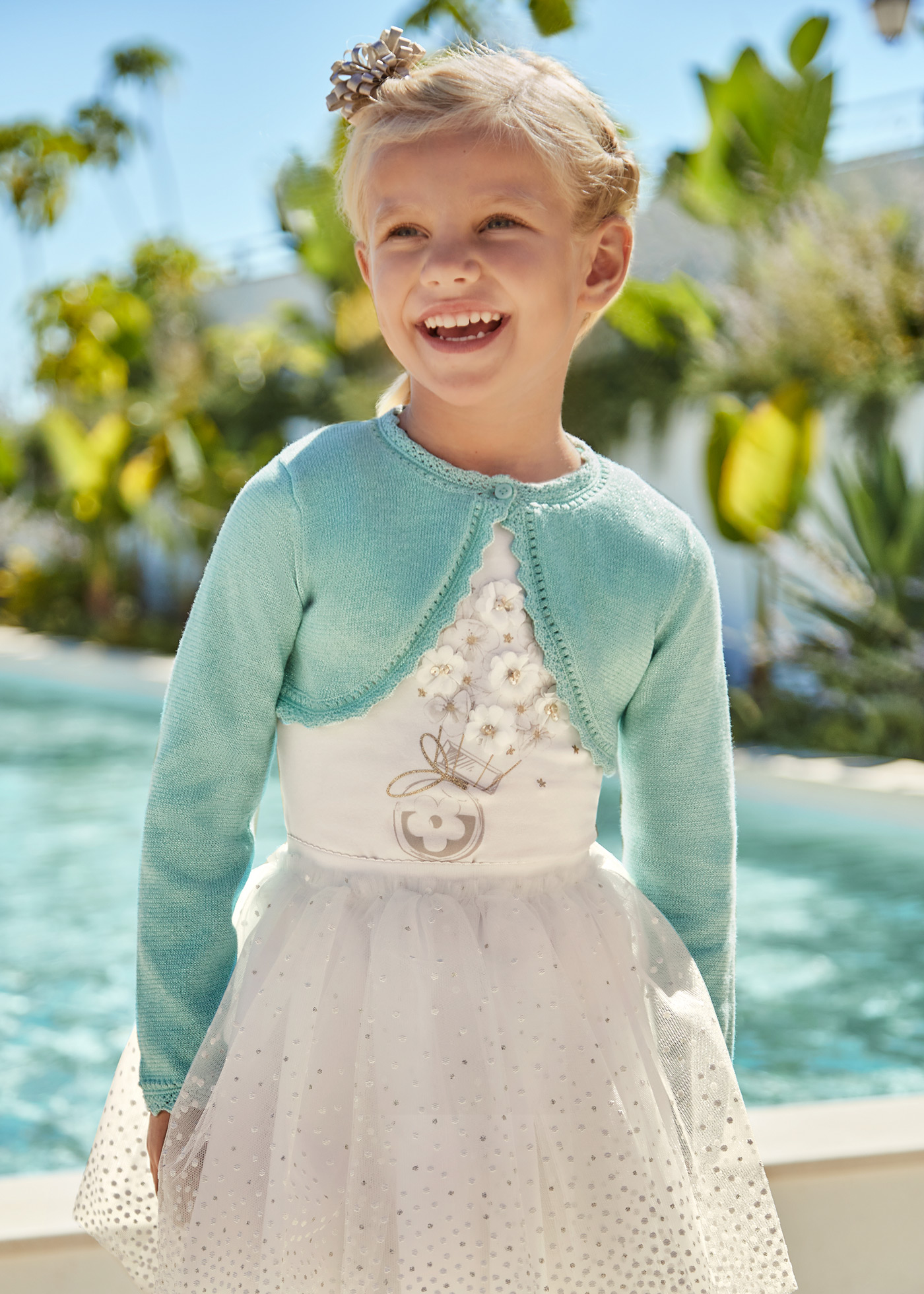 Cardigã estilo bolero em malha de algodão sustentável para meninas